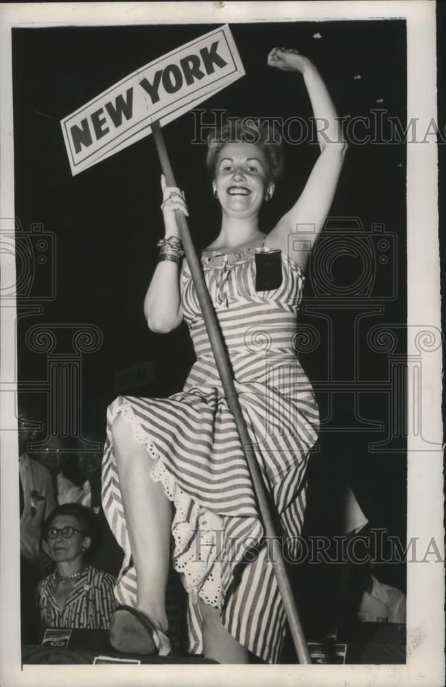 1948 Press Photo Virginia Bell Jack raises her state's banner - nef60434 - Historic Images
