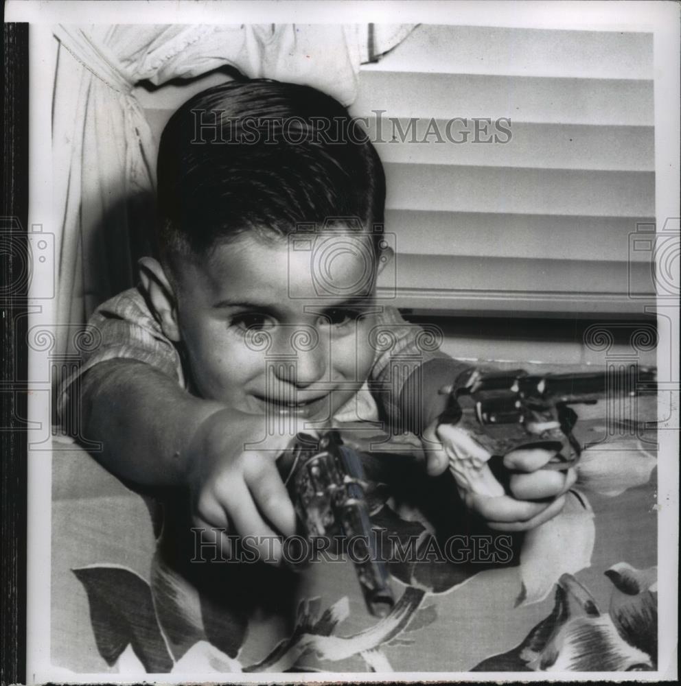 1956 Press Photo Mike Sibole plays &quot;cowboy&quot; with the photographer - nef60975 - Historic Images