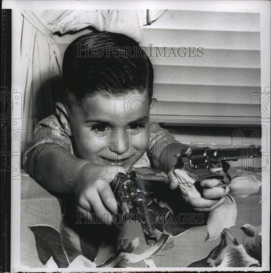 1956 Press Photo Mike Sibole plays "cowboy" with the photographer - nef60975 - Historic Images