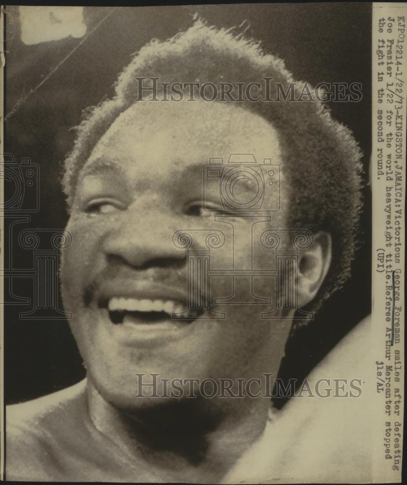 1971 Press Photo George Foreman smiles after defeating Joe Frazier - nef59591 - Historic Images