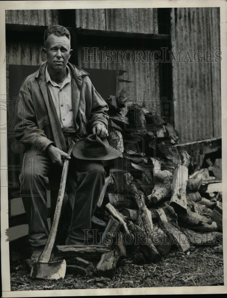 1933 Press Photo Henry C Kornstad  with woodpile on his California farm - Historic Images