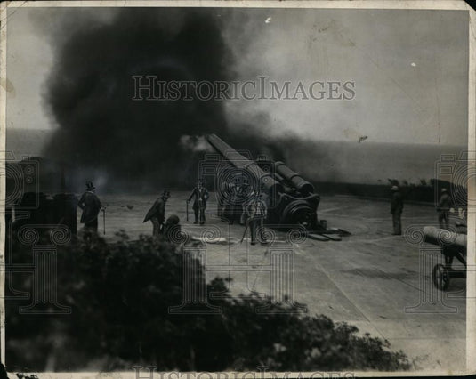1935 Press Photo Military men firing a long gun cannon at practice - neo00778 - Historic Images
