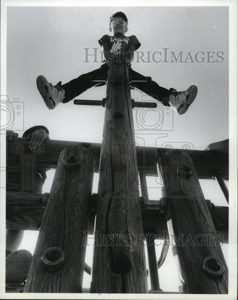 1991 Press Photo Mark Gilliard plays at playground in Manito Park - spa41538 - Historic Images