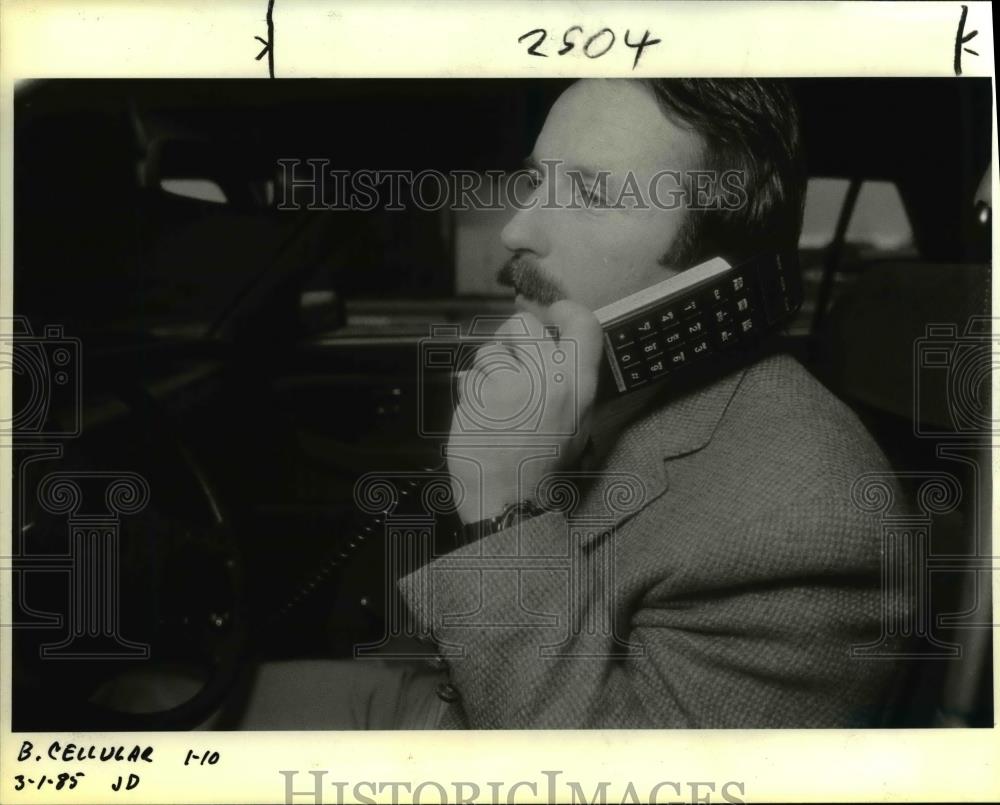 1985 Press Photo Phil Lyle Tests New Cellular Car Phone - orb54572 - Historic Images