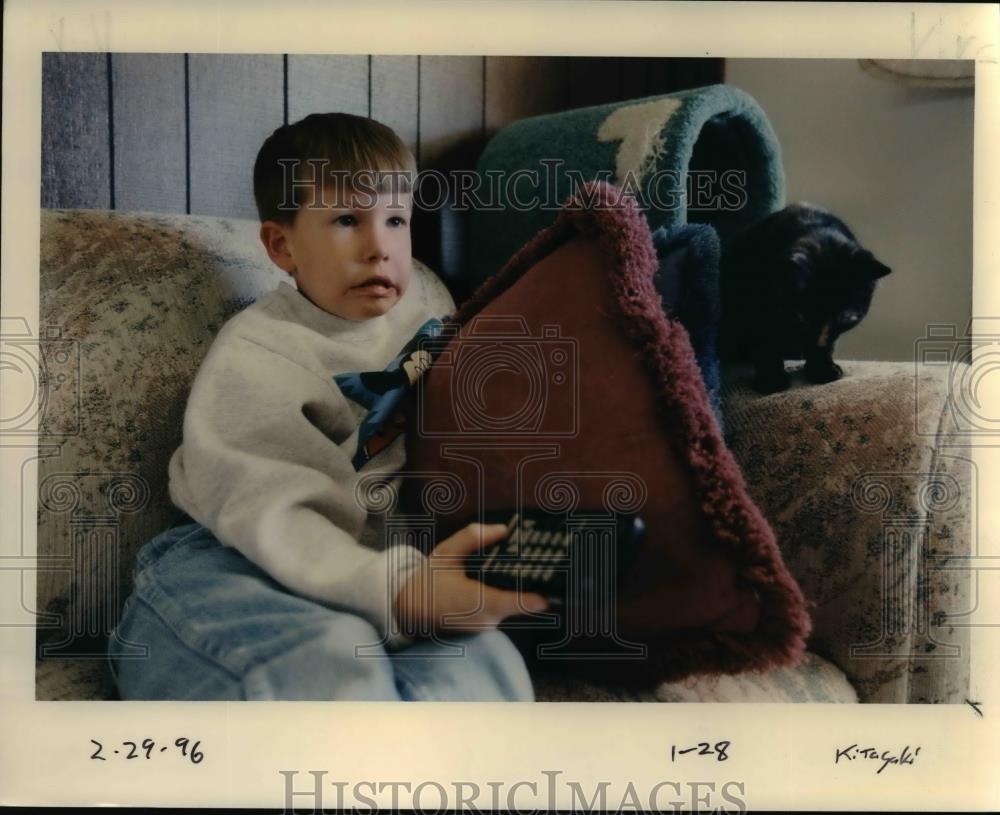1996 Press Photo Boy watch in a television - orb54673 - Historic Images