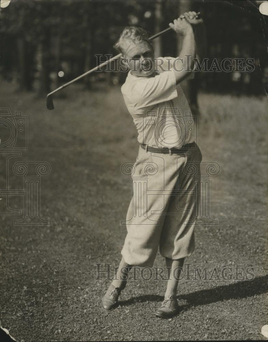 1930 Press Photo Golfer Harry Switzer poses for a photo after taking a swing - Historic Images