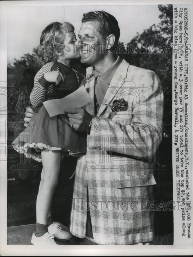 1957 Press Photo Margo Norvell Kisses The Cheek Of Al Basselink - net33342 - Historic Images