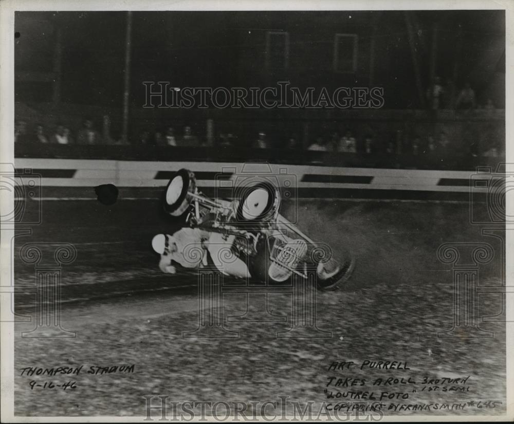 1947 Press Photo Art Purrell flips his car at Thompson Stadium track - net33906 - Historic Images