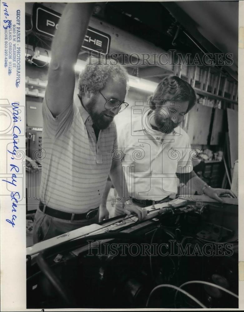1983 Press Photo Final Tuneup- Win Casey (left) and Ray Searcy attend to car. - Historic Images