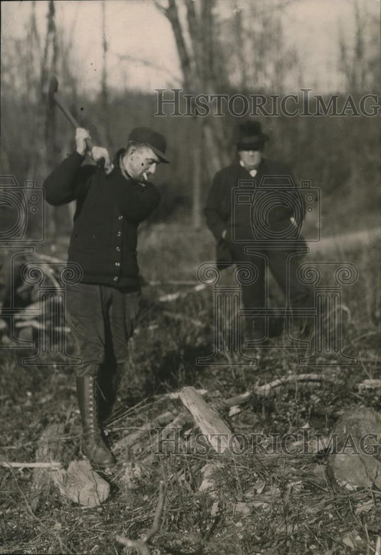 1920 Press Photo Boxer Elmer Smith chops wood at training camp - net30536 - Historic Images