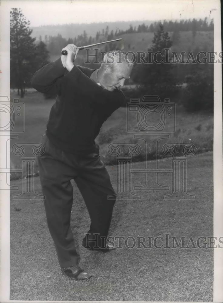 1953 Press Photo Golfer Neil Christian practices his swing - sps00901 - Historic Images