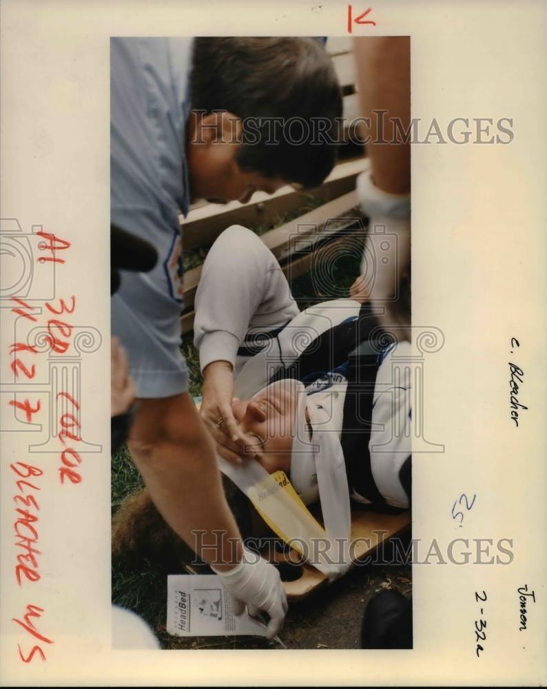 1991 Press Photo Woman injured after bleachers collapsed at a soccer g