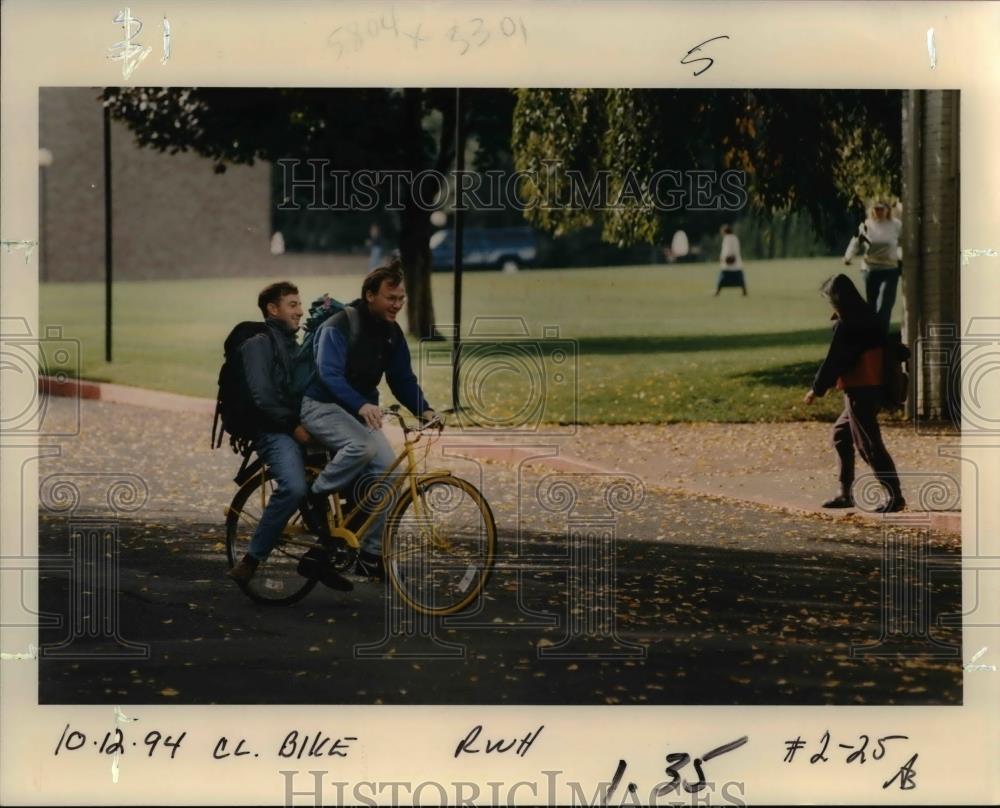 1994 Press Photo Pair Riding Bicycle - orb01239 - Historic Images