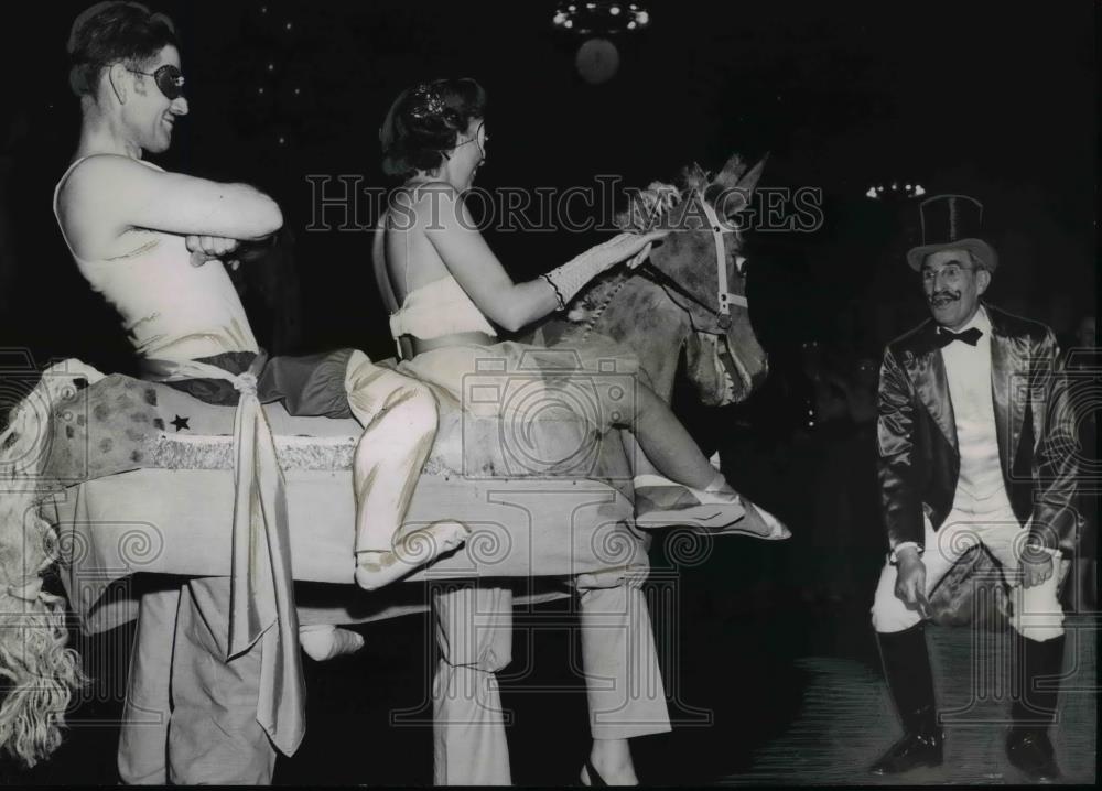 1951 Press Photo Mr. And Mrs. Clyde Archibald On Homemade Horse - orb02030 - Historic Images