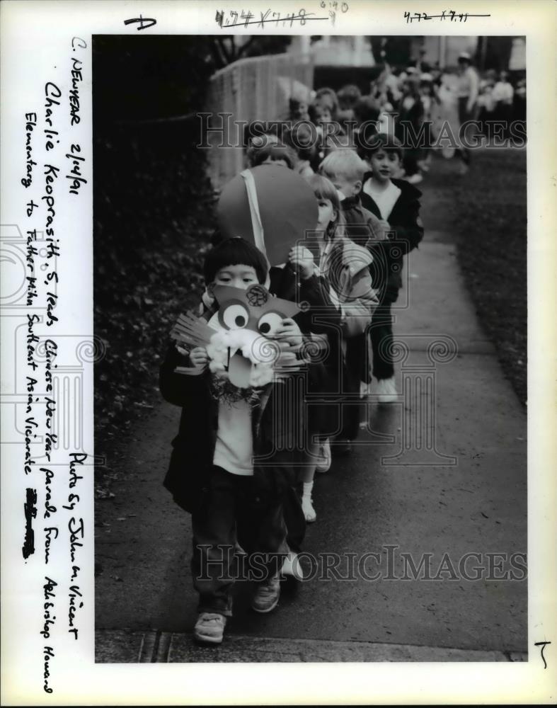 1991 Press Photo Charlie Keoprasith Leads Chinese New Year Parade - orb04429 - Historic Images