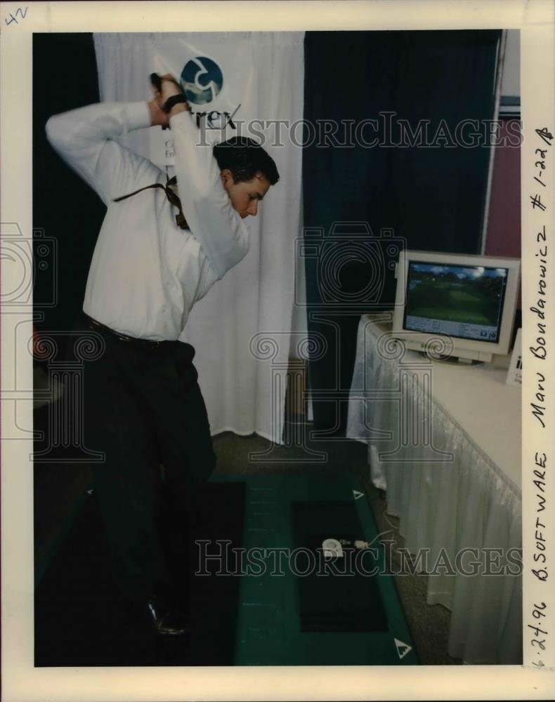 1996 Press Photo Playing mini-golf at Intrex company - orb08098 - Historic Images