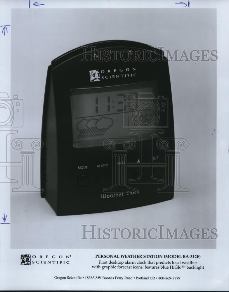 1996 Press Photo First desktop alarm clock that predicts local weather with - Historic Images