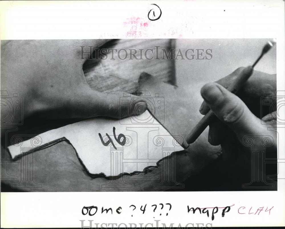 1984 Press Photo Ceramic cleaning tool is used to outline Oklahoma. - orb23919 - Historic Images