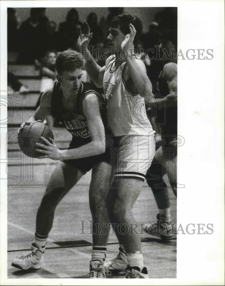 1992 Press Photo St. Maries High School basketball player, Eric Clyne at a game - Historic Images