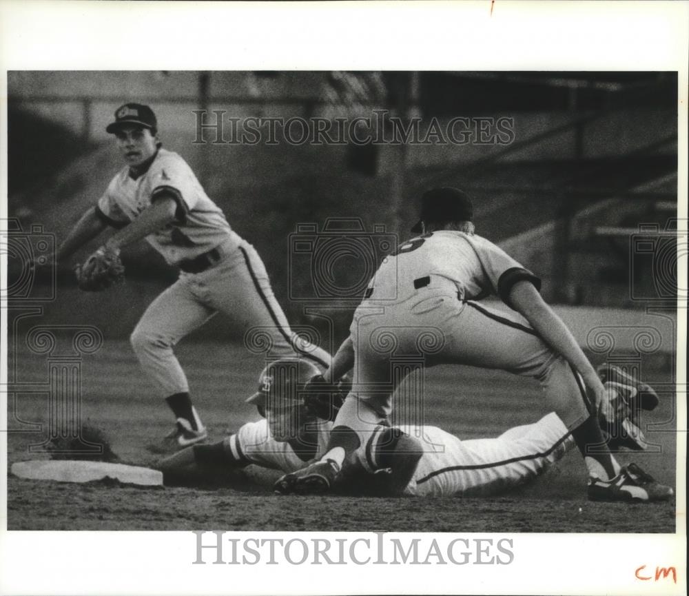 1990 Press Photo Brent Bish Gets a Safe Ride Into Second Base at Baseball Game - Historic Images