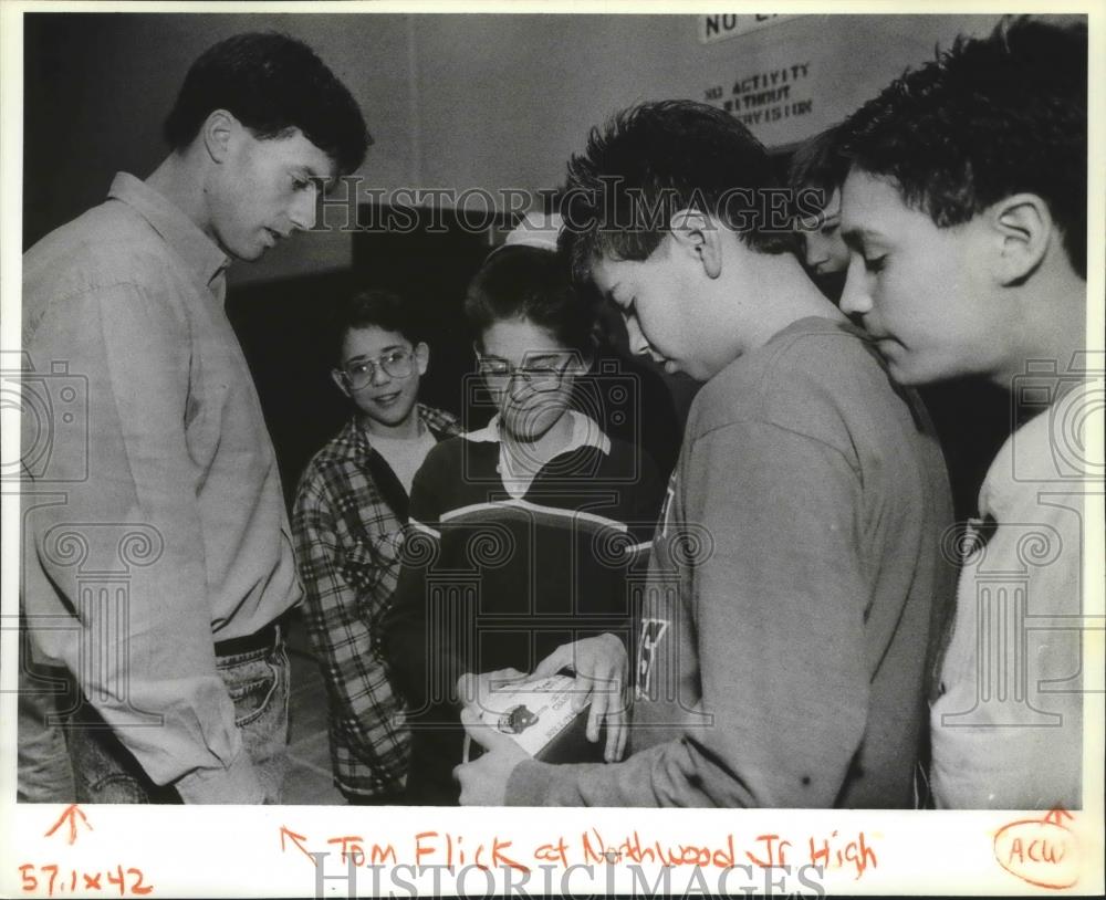 1993 Press Photo Tom Flick-Former NFL Player Singing Autographs at School - Historic Images