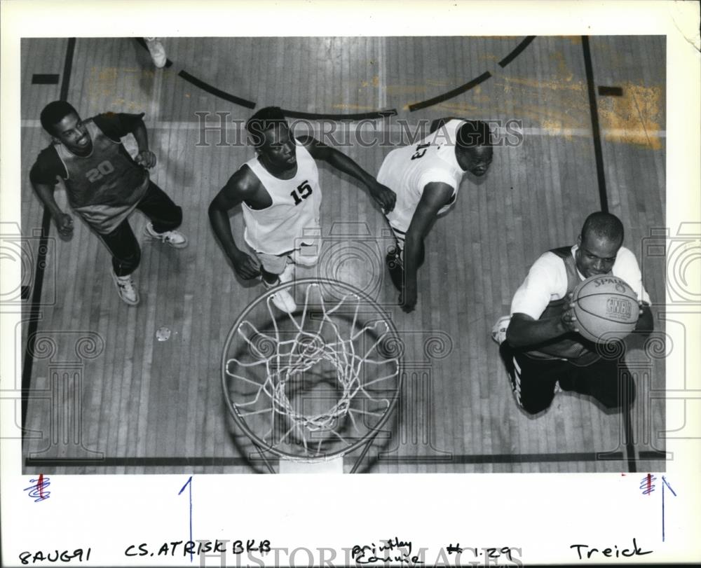 1991 Press Photo Cagers play basketball at Northeast Family YMCA - orb61420 - Historic Images
