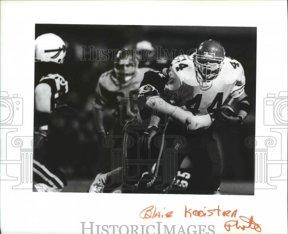 1991 Press Photo Jason Baldwin during a Greater Spokane League football game - Historic Images