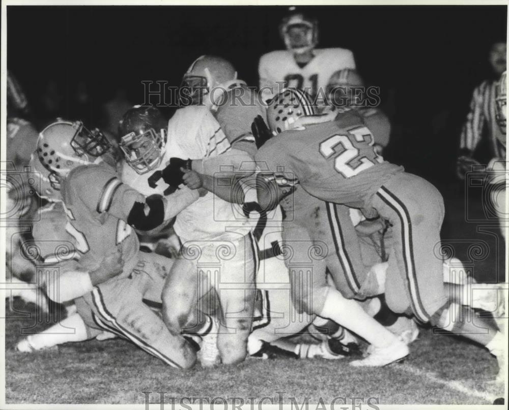 1988 Press Photo Reardan high school&#39;s Jason Graham tackled in football action - Historic Images