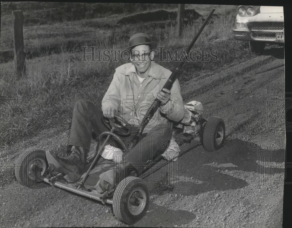 1960 Press Photo Harold Koch aboard his go-kart, ready for hunting season - Historic Images