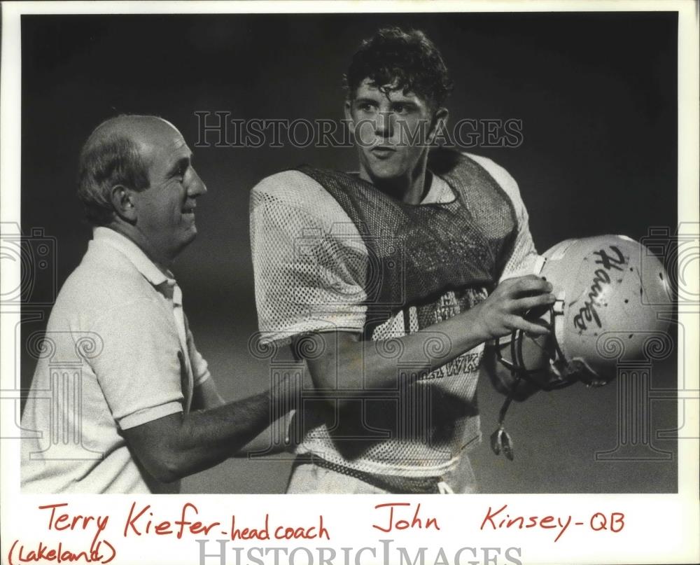 1991 Press Photo Terry Kiefer-Lakeland Football Head Coach Speaks With Player - Historic Images