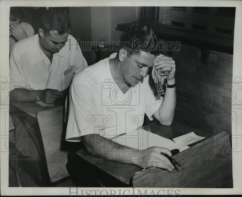 1947 Press Photo New York Police Sgt Nelson Lacher takes an exam in NYC - Historic Images