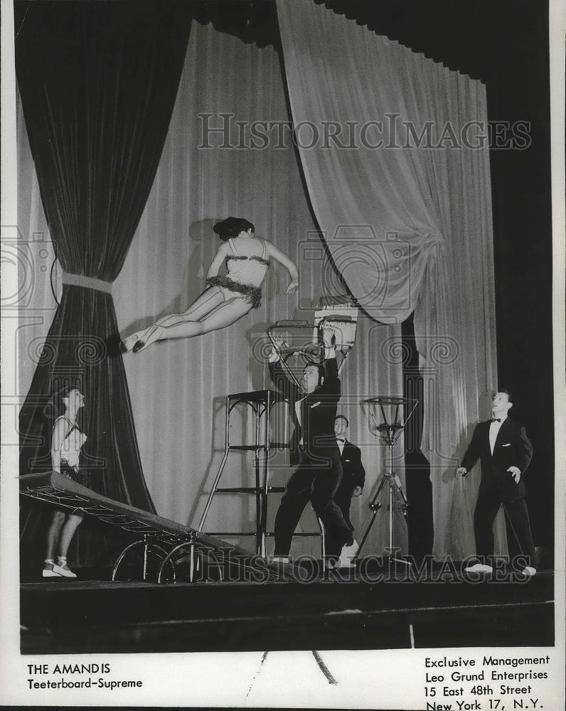 Press Photo Stunt performers, The Amandis, Teeterboard-Supreme, in action - Historic Images