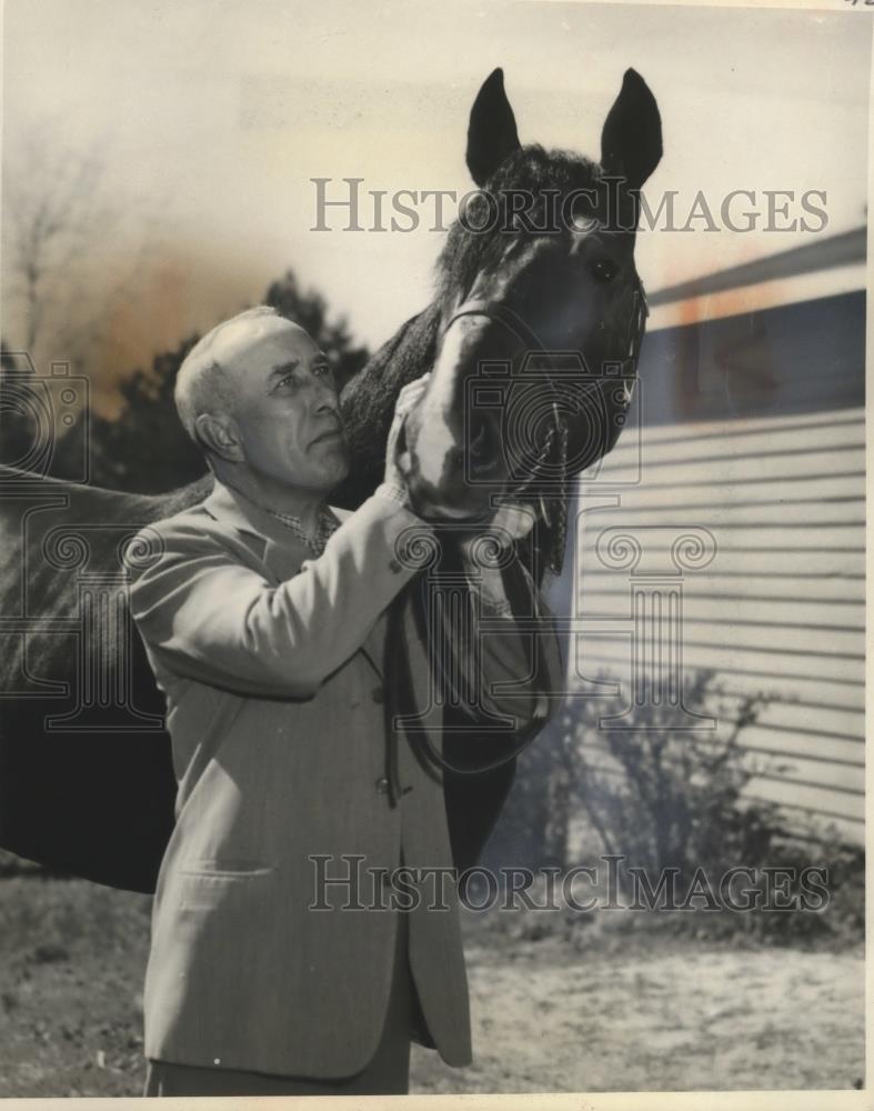 1955 Press Photo A man with his race horse at a track stables - neo14853 - Historic Images