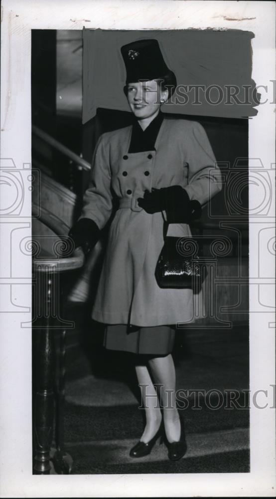 Press Photo Woman Modeling Coat, Skirt, and Fez-Like Hat - neo17001 - Historic Images