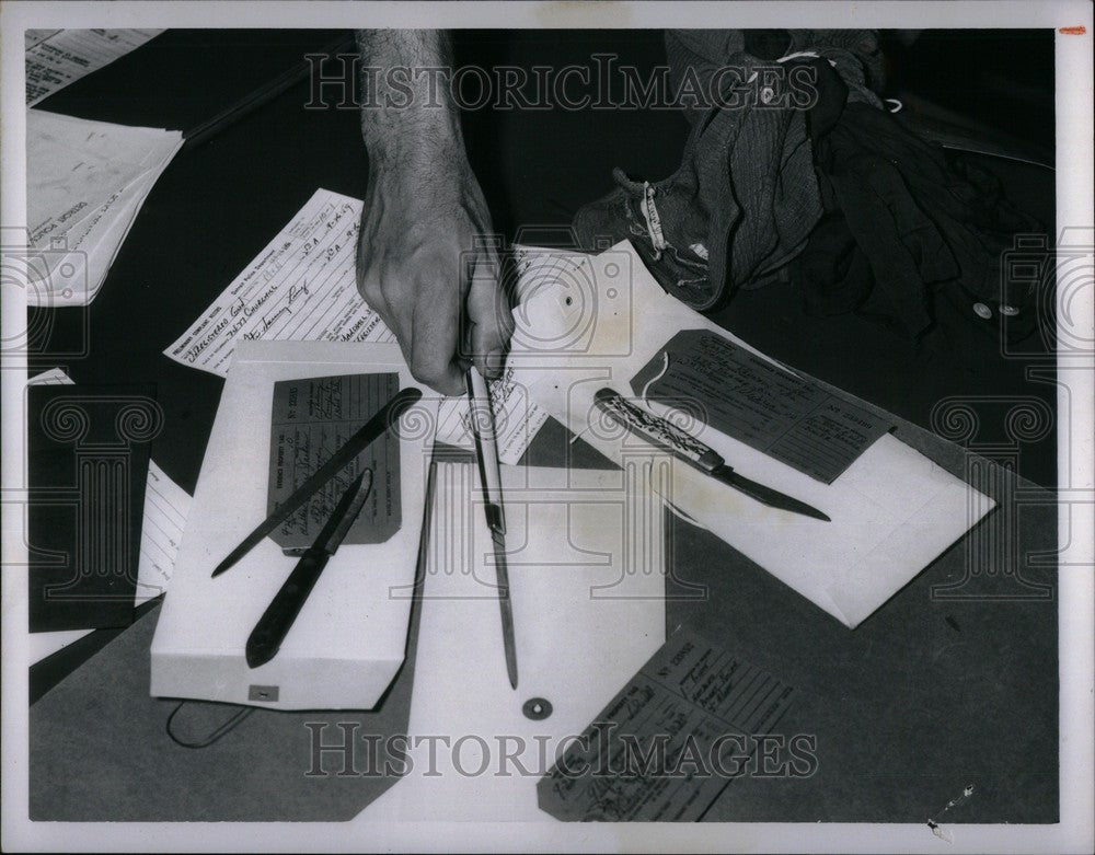 1959 Press Photo Weapons Seized After Attack crime - Historic Images