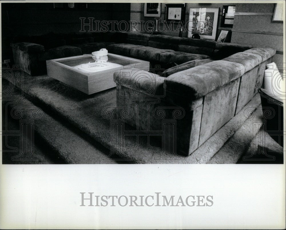 Press Photo Monaghan&#39;s office suede couch - Historic Images