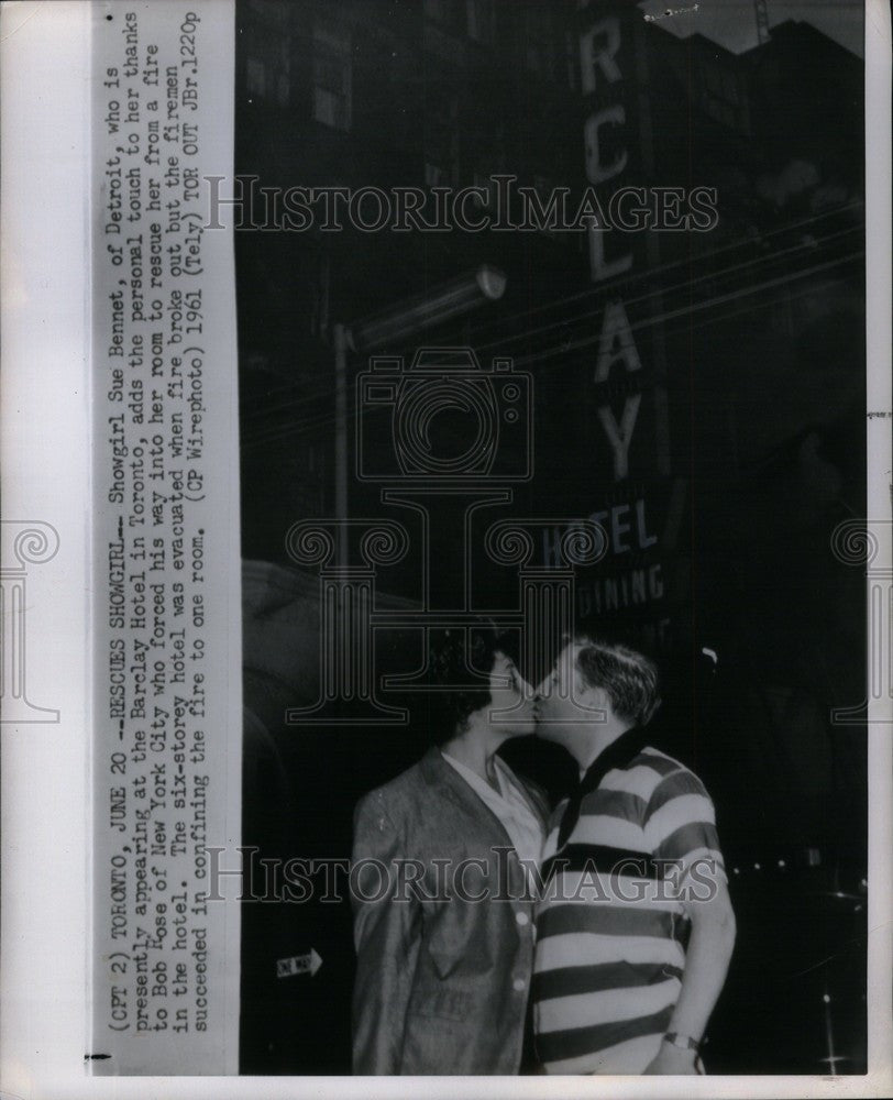 1961 Press Photo Showgirl Sue Bennett rescued from fire - Historic Images