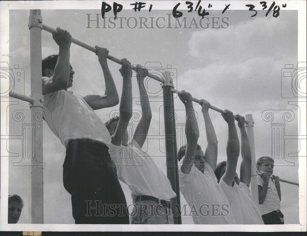 1957 Press Photo Chin Up Junior Olympics - Historic Images