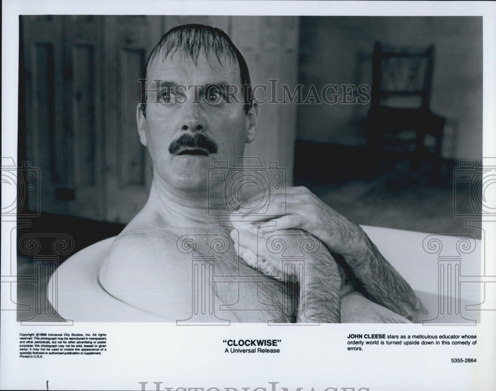 1986 Press Photo Actor John Cleese in "Clockwise" Film - Historic Images