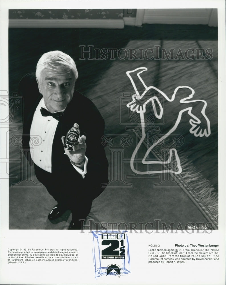 1991 Press Photo Leslie Nielsen Stars In Naked Gun 2 1/2 - Historic Images