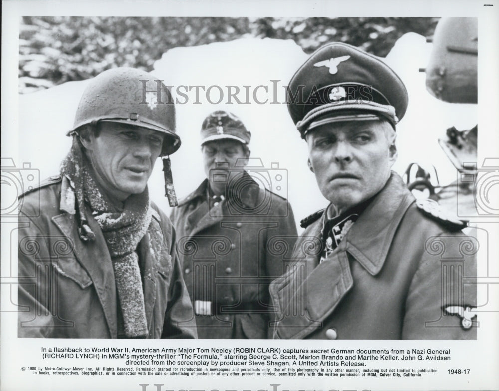 1985 Press Photo &quot;The Formula&quot; Richard Lynch &amp; Robin Clark - Historic Images