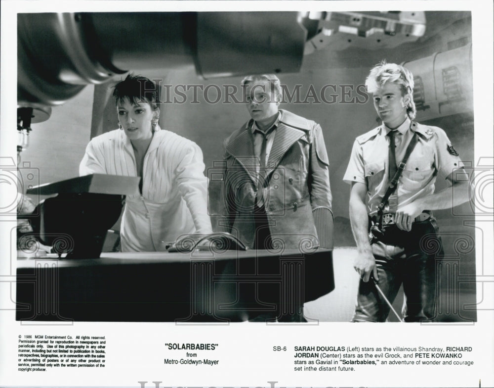 1986 Press Photo Sarah Douglas, Richard Jordan And Pete Kowanko In "Solarbabies" - Historic Images