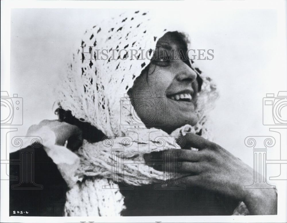 Press Photo Woman Wears Scarf To Cover Her Head - Historic Images