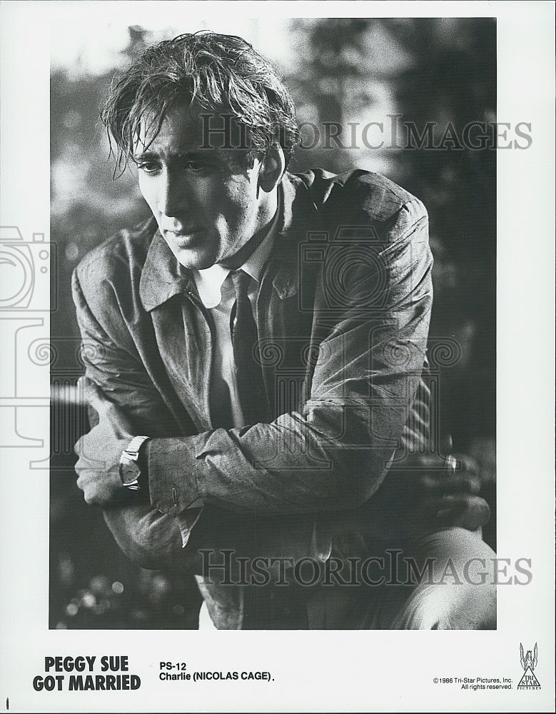 1986 Press Photo Nicolas Cage stars in "Peggy Sue Got Married" - Historic Images