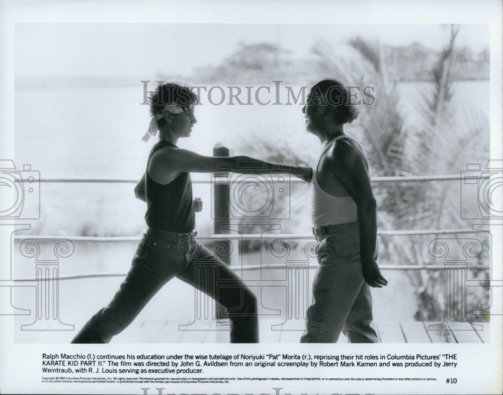 1985 Press Photo Actors Ralph Macchio And Pat Morita In "The Karate Kid Part II" - Historic Images