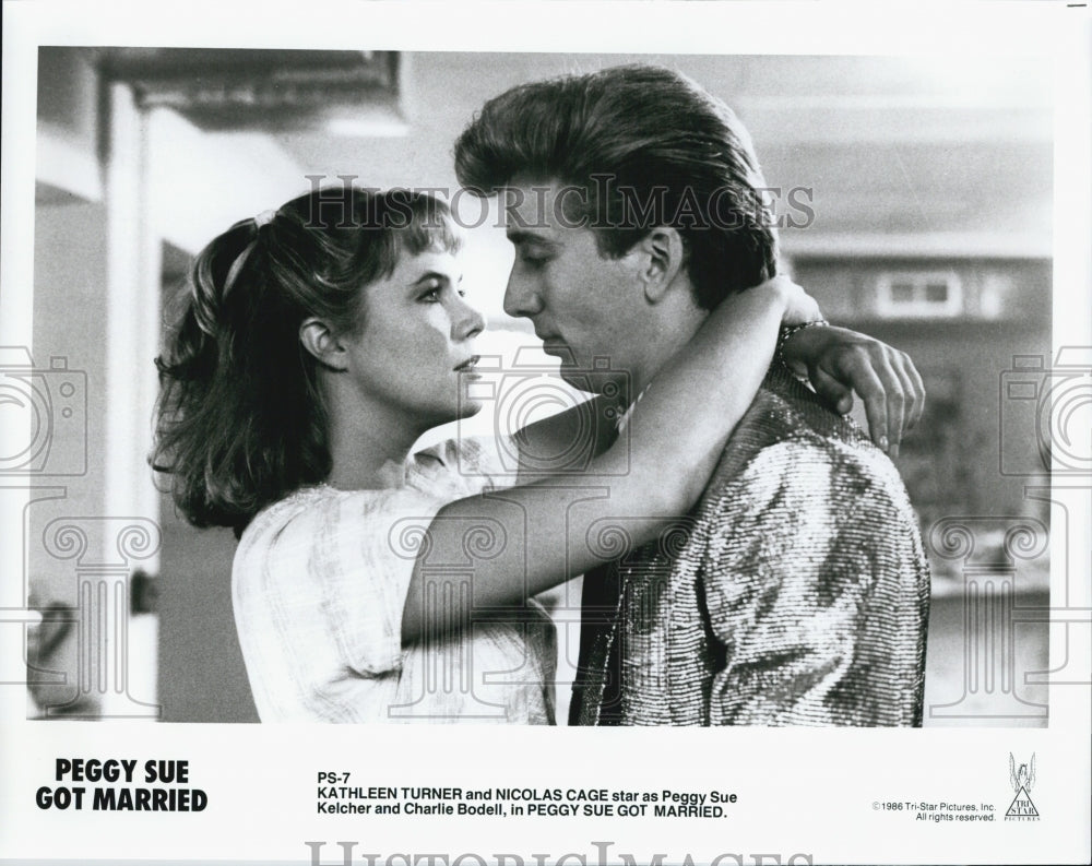 1986 Press Photo Nicolas Cage, Kathleen Turner "Peggy Sue Got Married" - Historic Images