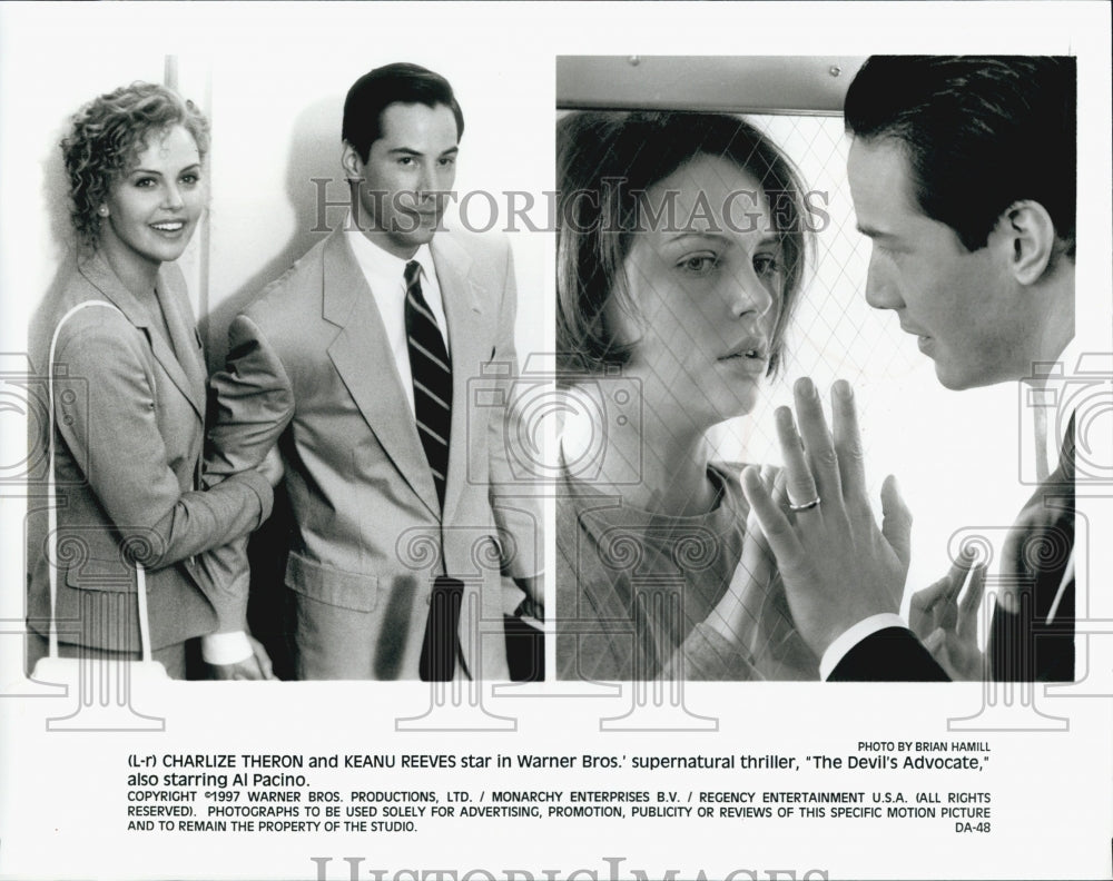 1997 Press Photo "The Devil's Advocate" Charlize Theron, Keanu Reeves - Historic Images