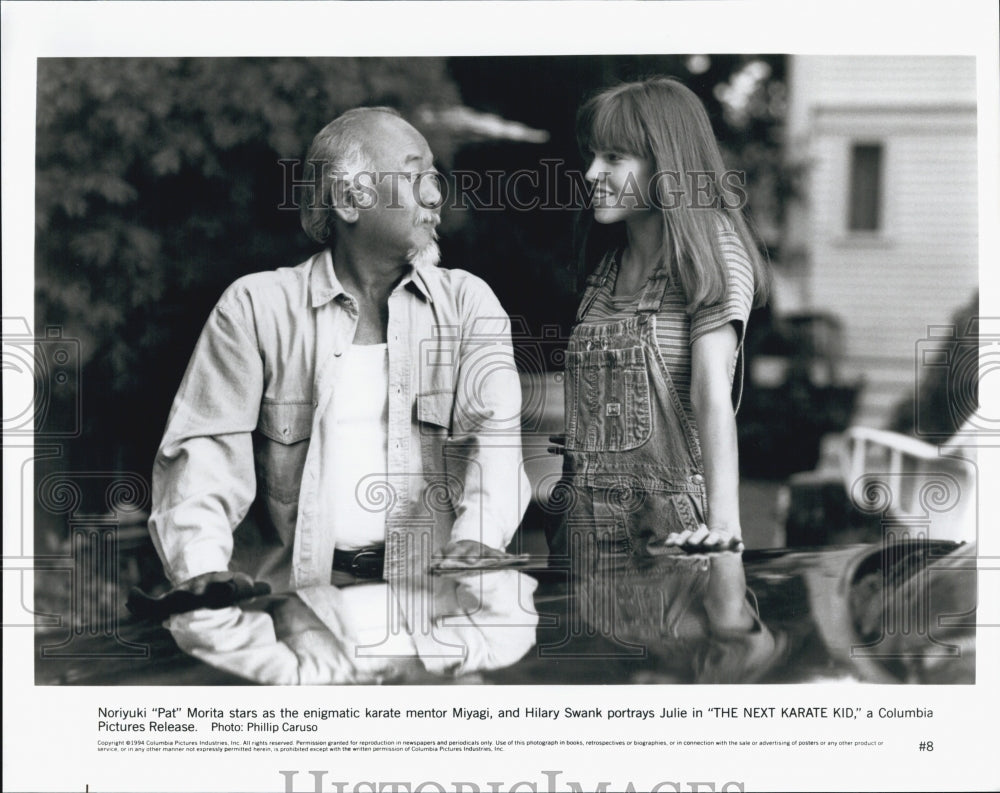 1994 Press Photo Actors Pat Morita Hilary Swank In "The Next Karate Kid" - Historic Images