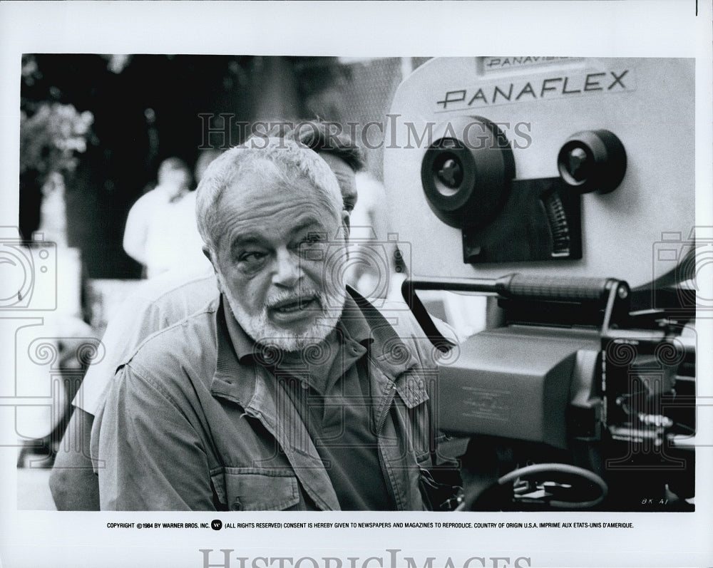 1984 Press Photo Director posing for photo - Historic Images