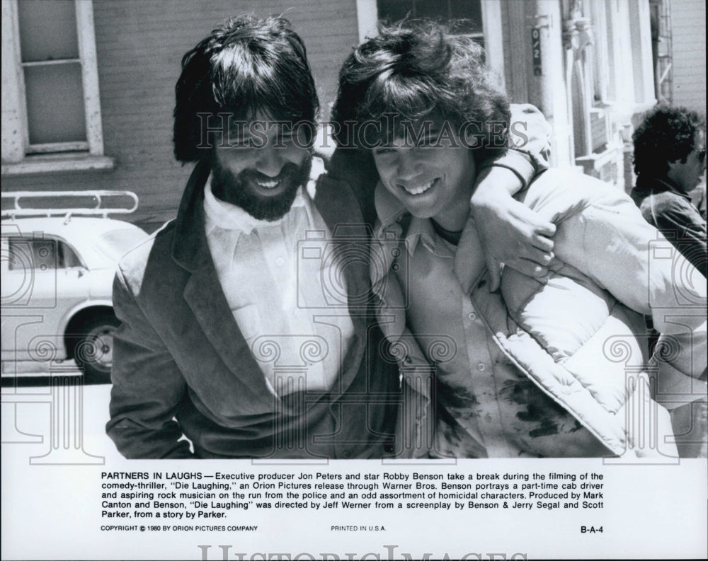 1980 Press Photo &quot;Die Laughing&quot; Executive Producer Jon Peters and Star Robby - Historic Images